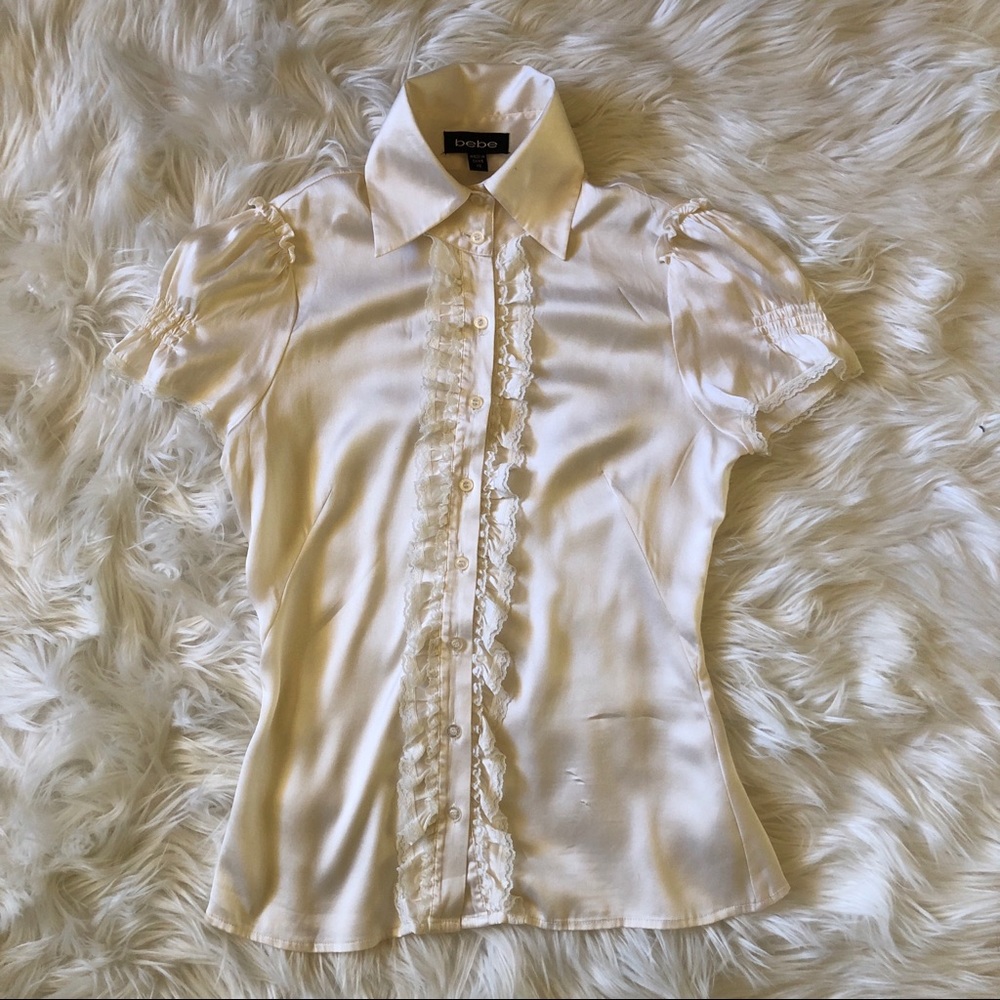 BEBE size XS cream colored collared blouse
